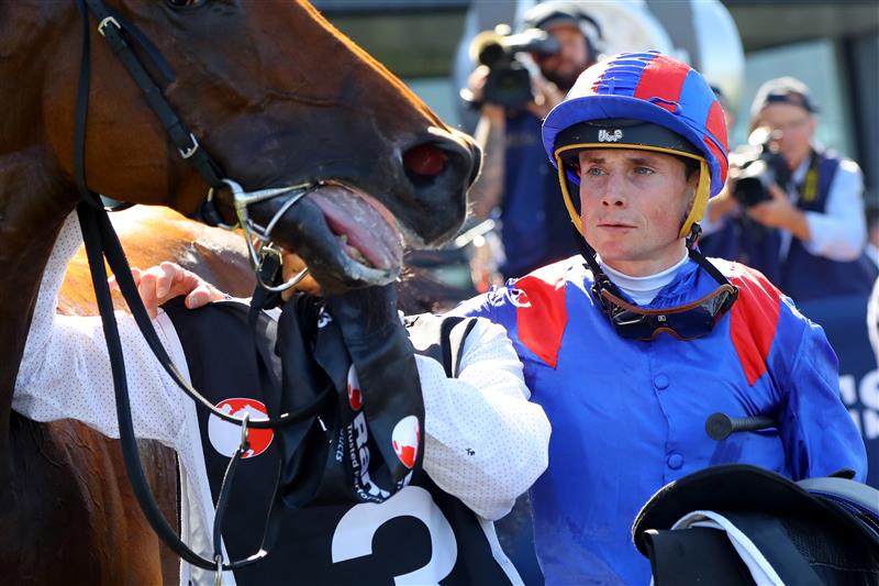 SYDNEY, AUSTRALIA - MARCH 18: Ryan Moore riding Dubai Honour wins Race 6 Ranvet Stakes during the Longines Golden Slipper Day - Sydney Racing at Rosehill Gardens on March 18, 2023 in Sydney, Australia. (Photo by Jeremy Ng/Getty Images)