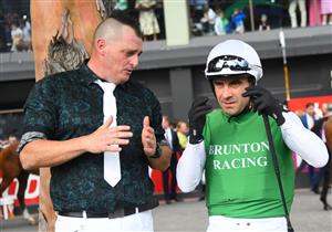 MELBOURNE, AUSTRALIA - MARCH 18: Trainer Scott Brunton and Daved Pires are seen before Race 7, the The Sharp Eit All-star Mile, during Melbourne Racing at Moonee Valley Racecourse on March 18, 2023 in Melbourne, Australia. (Photo by Vince Caligiuri/Getty Images)