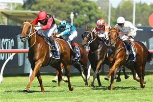 SYDNEY, AUSTRALIA - MARCH 18: Tyler Schiller riding Opal Ridge wins Race 5 Irresistible Pools Darby Munro during the Longines Golden Slipper Day - Sydney Racing at Rosehill Gardens on March 18, 2023 in Sydney, Australia. (Photo by Jeremy Ng/Getty Images)