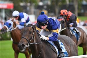 MELBOURNE, AUSTRALIA - MARCH 18: Craig Newitt riding Munhamek winning Race 5, the The Branched Logistics Mugatoo, during Melbourne Racing at Moonee Valley Racecourse on March 18, 2023 in Melbourne, Australia. (Photo by Vince Caligiuri/Getty Images)