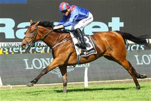 SYDNEY, AUSTRALIA - MARCH 18: Ryan Moore riding Dubai Honour wins Race 6 Ranvet Stakes during the Longines Golden Slipper Day - Sydney Racing at Rosehill Gardens on March 18, 2023 in Sydney, Australia. (Photo by Jeremy Ng/Getty Images)