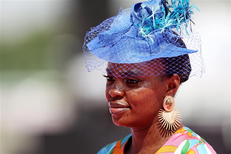 DUBAI, UNITED ARAB EMIRATES - MARCH 25: A racegoer looks on during the Dubai World Cup at Meydan Racecourse on March 25, 2023 in Dubai, United Arab Emirates. (Photo by Christopher Pike/Getty Images)
