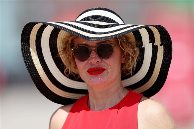 DUBAI, UNITED ARAB EMIRATES - MARCH 25: A racegoer looks on during the Dubai World Cup at Meydan Racecourse on March 25, 2023 in Dubai, United Arab Emirates. (Photo by Christopher Pike/Getty Images)
