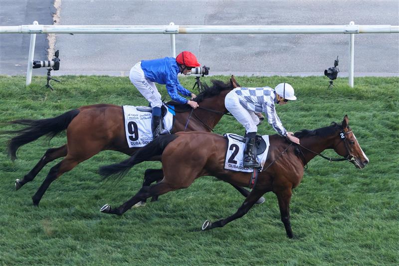 Jockey Ryan Moore on Broome (#2) overtakes William Buick on Siskany to win the Dubai World Cup horse racing event at the Meydan racecourse in Dubai on March 25, 2023. (Photo by Karim SAHIB / AFP) (Photo by KARIM SAHIB/AFP via Getty Images)