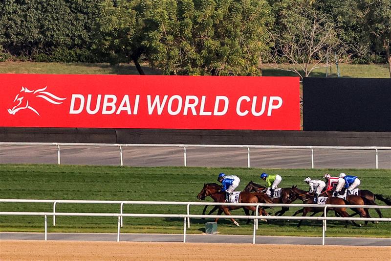 Jockeys compete in the Dubai Gold Cup race during the Dubai World Cup horse racing event at the Meydan racecourse in Dubai on March 25, 2023. (Photo by Karim SAHIB / AFP) / The erroneous mention[s] appearing in the metadata of this photo by Karim SAHIB has been modified in AFP systems in the following manner: [Jockeys compete] instead of [English jockey Ryan Moore, riding on the horse "Broome"]. Please immediately remove the erroneous mention[s] from all your online services and delete it (them) from your servers. If you have been authorized by AFP to distribute it (them) to third parties, please ensure that the same actions are carried out by them. Failure to promptly comply with these instructions will entail liability on your part for any continued or post notification usage. Therefore we thank you very much for all your attention and prompt action. We are sorry for the inconvenience this notification may cause and remain at your disposal for any further information you may require. (Photo by KARIM SAHIB/AFP via Getty Images)
