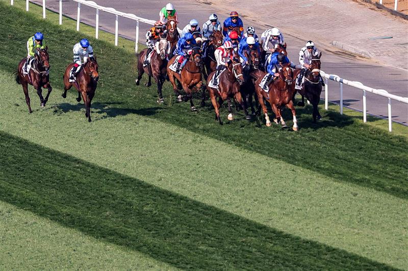 Jockeys compete in the Dubai Gold Cup race during the Dubai World Cup horse racing event at the Meydan racecourse in Dubai on March 25, 2023. (Photo by Karim SAHIB / AFP) / The erroneous mention[s] appearing in the metadata of this photo by Karim SAHIB has been modified in AFP systems in the following manner: [Jockeys compete] instead of [English jockey Ryan Moore, riding on the horse "Broome"]. Please immediately remove the erroneous mention[s] from all your online services and delete it (them) from your servers. If you have been authorized by AFP to distribute it (them) to third parties, please ensure that the same actions are carried out by them. Failure to promptly comply with these instructions will entail liability on your part for any continued or post notification usage. Therefore we thank you very much for all your attention and prompt action. We are sorry for the inconvenience this notification may cause and remain at your disposal for any further information you may require. (Photo by KARIM SAHIB/AFP via Getty Images)
