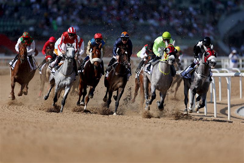 DUBAI, UNITED ARAB EMIRATES - MARCH 25: A general view of race action during the Dubai Kahayla Classic during the Dubai World Cup at Meydan Racecourse on March 25, 2023 in Dubai, United Arab Emirates. (Photo by Christopher Pike/Getty Images)