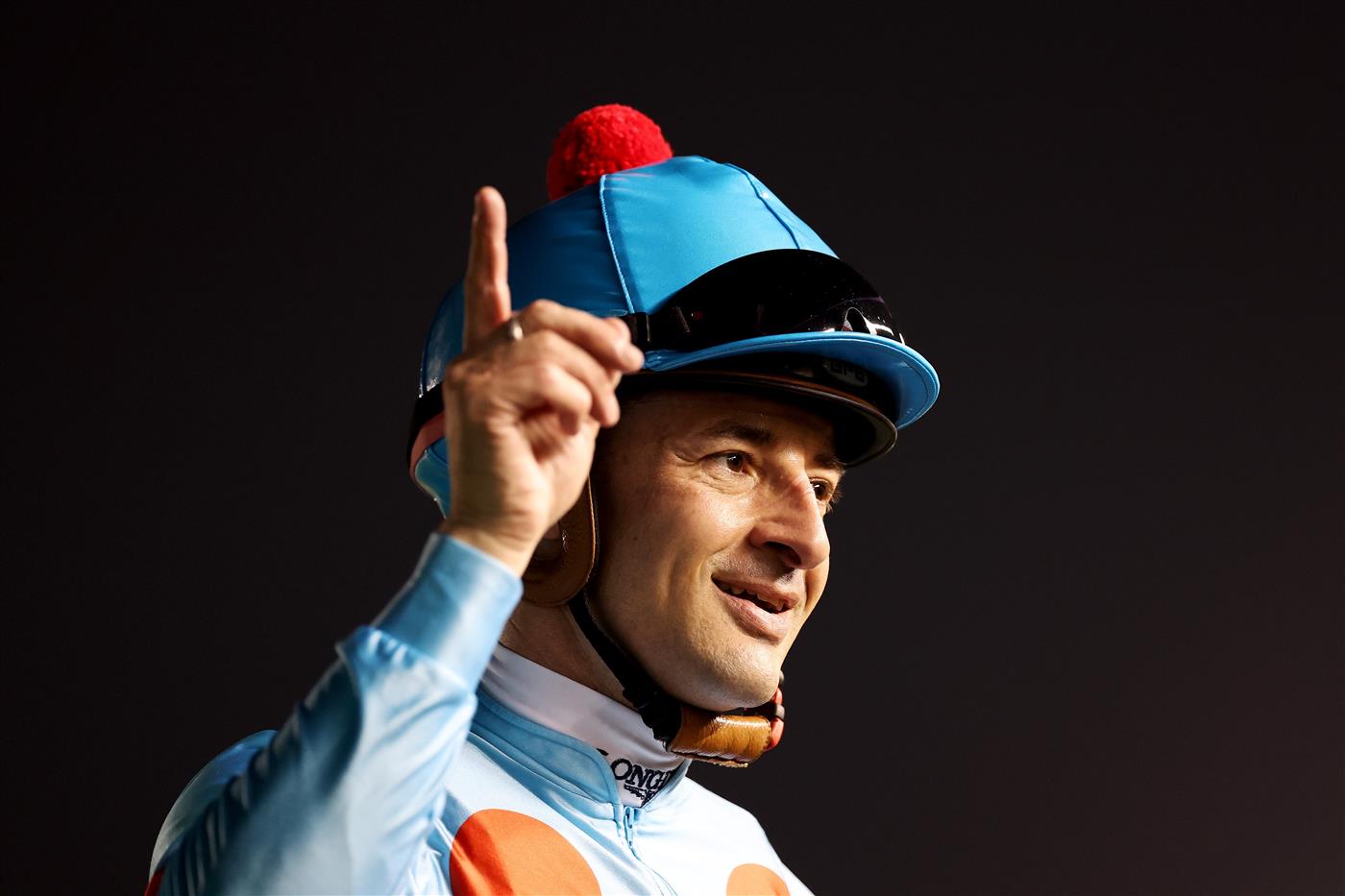 DUBAI, UNITED ARAB EMIRATES - MARCH 25: Christophe Lemaire riding Equinox celebrates winning the Longines Dubai Sheema Classic during the Dubai World Cup at Meydan Racecourse on March 25, 2023 in Dubai, United Arab Emirates. (Photo by Christopher Pike/Getty Images)