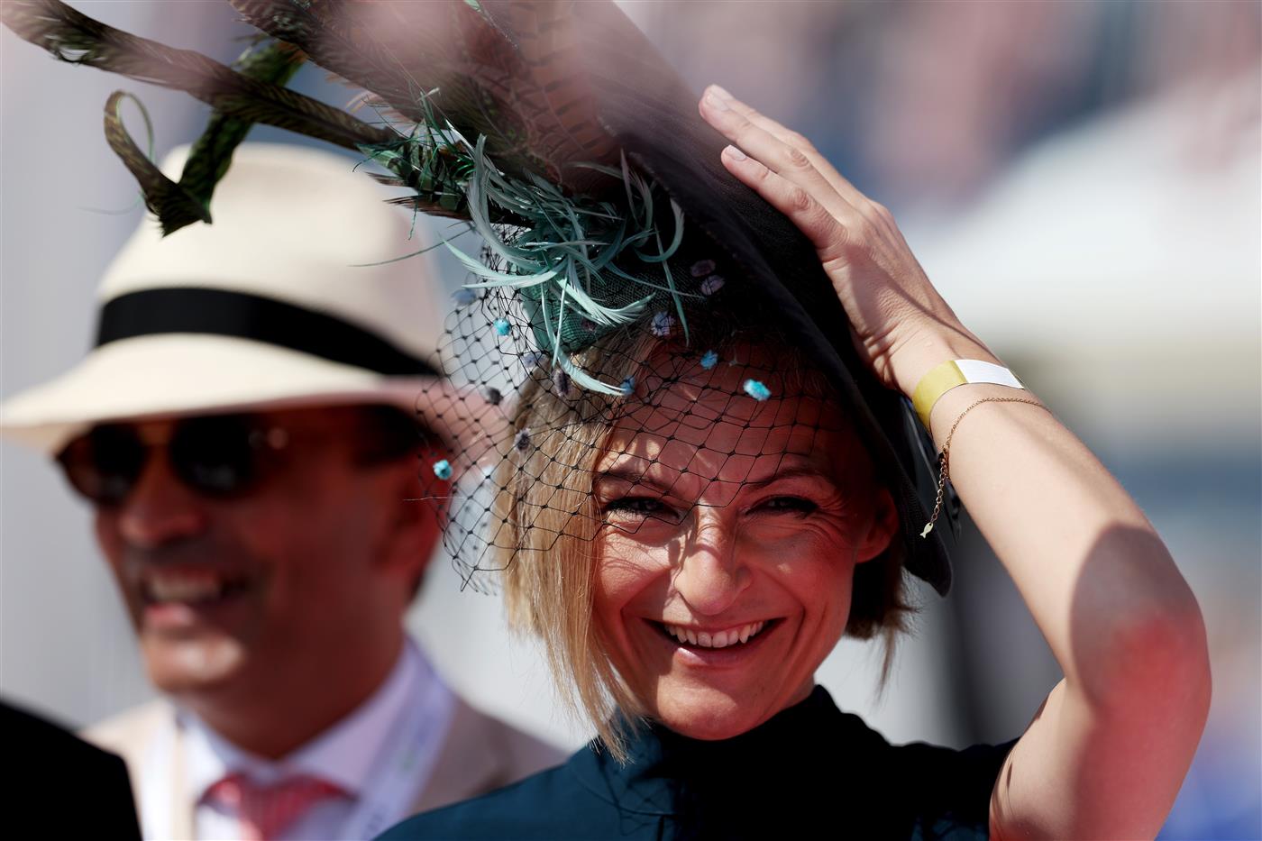 DUBAI, UNITED ARAB EMIRATES - MARCH 25: Racegoers look on during the Dubai World Cup at Meydan Racecourse on March 25, 2023 in Dubai, United Arab Emirates. (Photo by Christopher Pike/Getty Images)