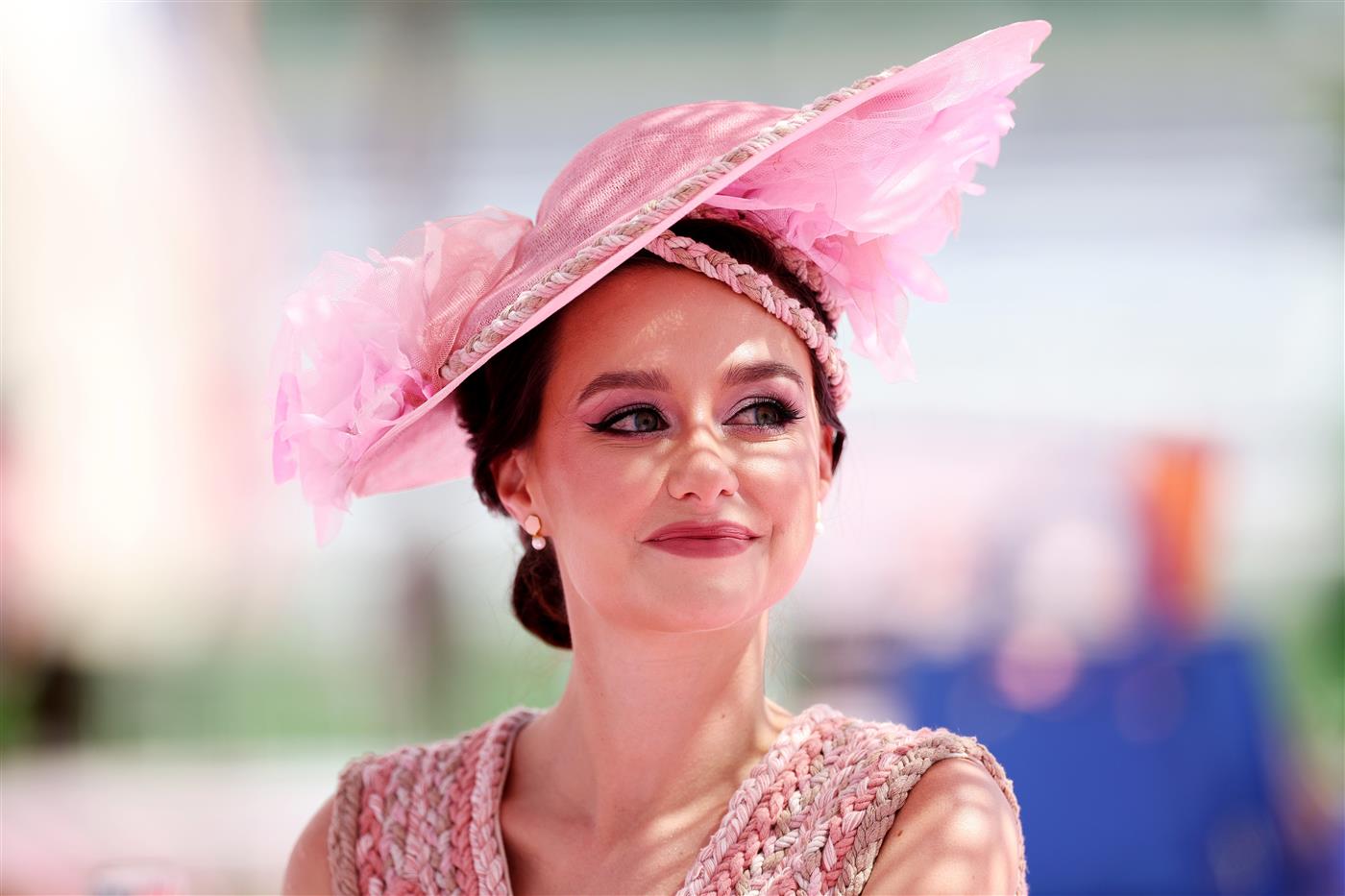 DUBAI, UNITED ARAB EMIRATES - MARCH 25: A racegoer looks on during the Dubai World Cup at Meydan Racecourse on March 25, 2023 in Dubai, United Arab Emirates. (Photo by Christopher Pike/Getty Images)