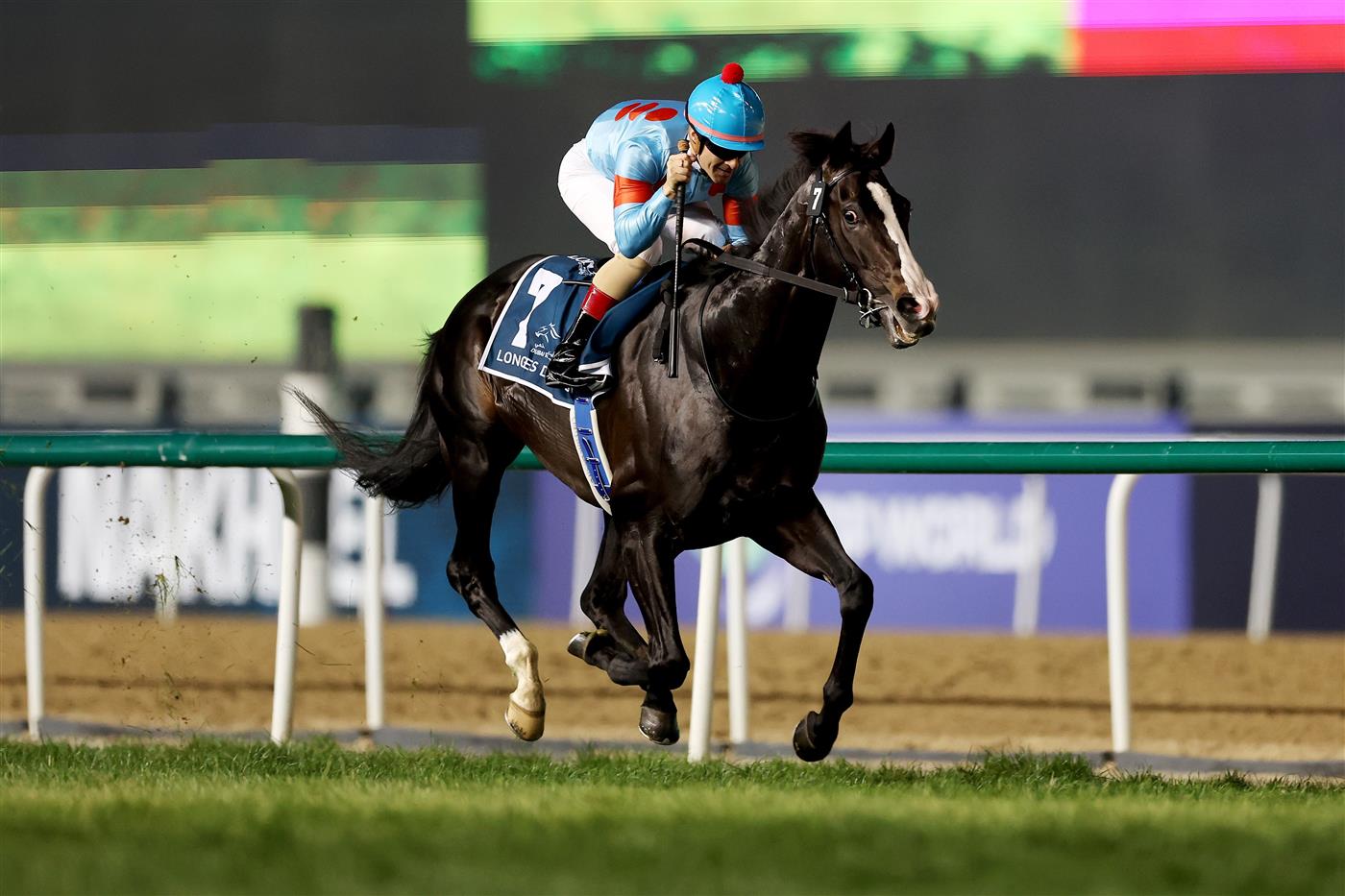DUBAI, UNITED ARAB EMIRATES - MARCH 25: Christophe Lemaire riding Equinox wins the Longines Dubai Sheema Classic during the Dubai World Cup at Meydan Racecourse on March 25, 2023 in Dubai, United Arab Emirates. (Photo by Christopher Pike/Getty Images)