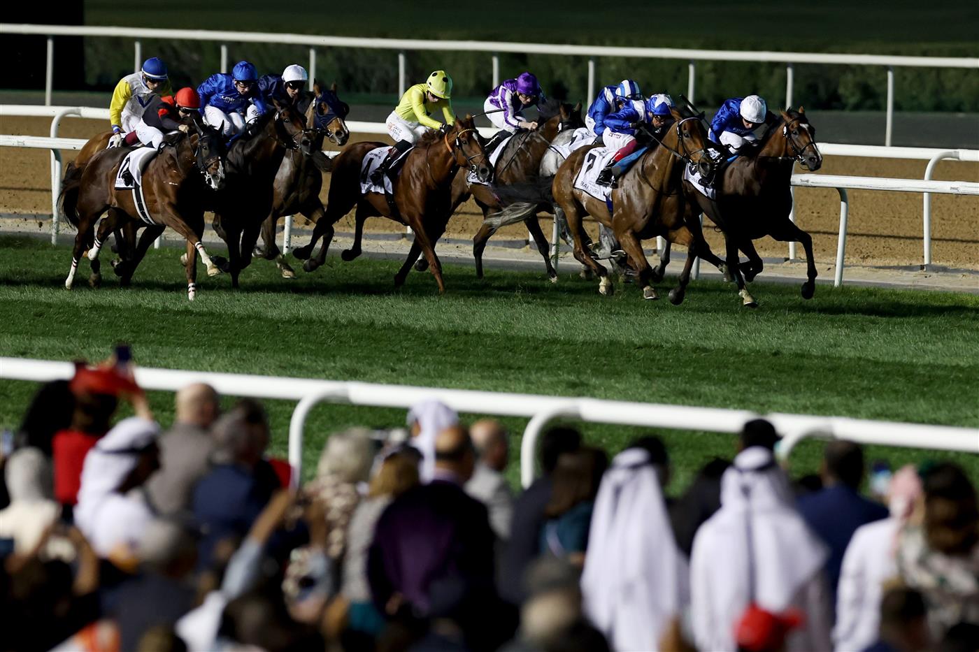 DUBAI, UNITED ARAB EMIRATES - MARCH 25: Lanfranco Dettori riding Lord North, 2nd right, wins the Dubai Turf during the Dubai World Cup at Meydan Racecourse on March 25, 2023 in Dubai, United Arab Emirates. (Photo by Christopher Pike/Getty Images)