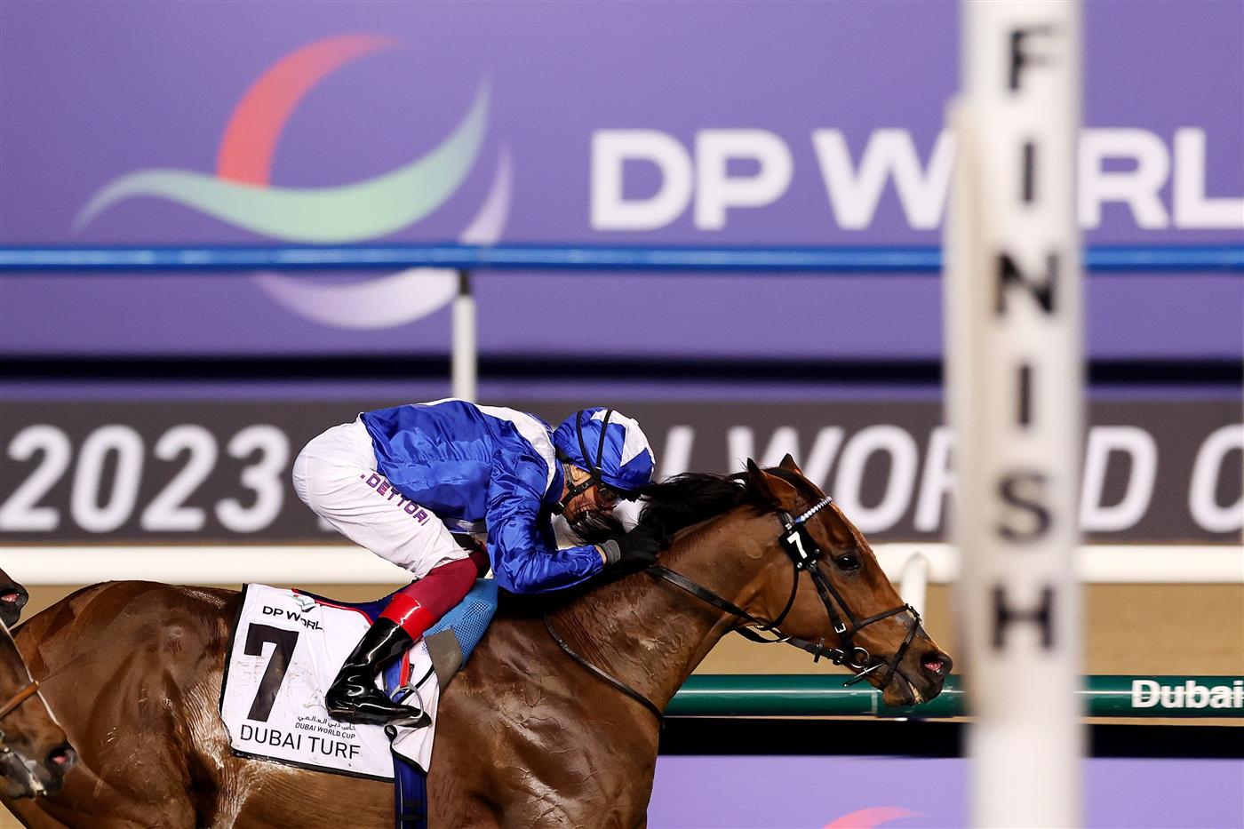 DUBAI, UNITED ARAB EMIRATES - MARCH 25: Lanfranco Dettori riding Lord North wins the Dubai Turf during the Dubai World Cup at Meydan Racecourse on March 25, 2023 in Dubai, United Arab Emirates. (Photo by Christopher Pike/Getty Images)