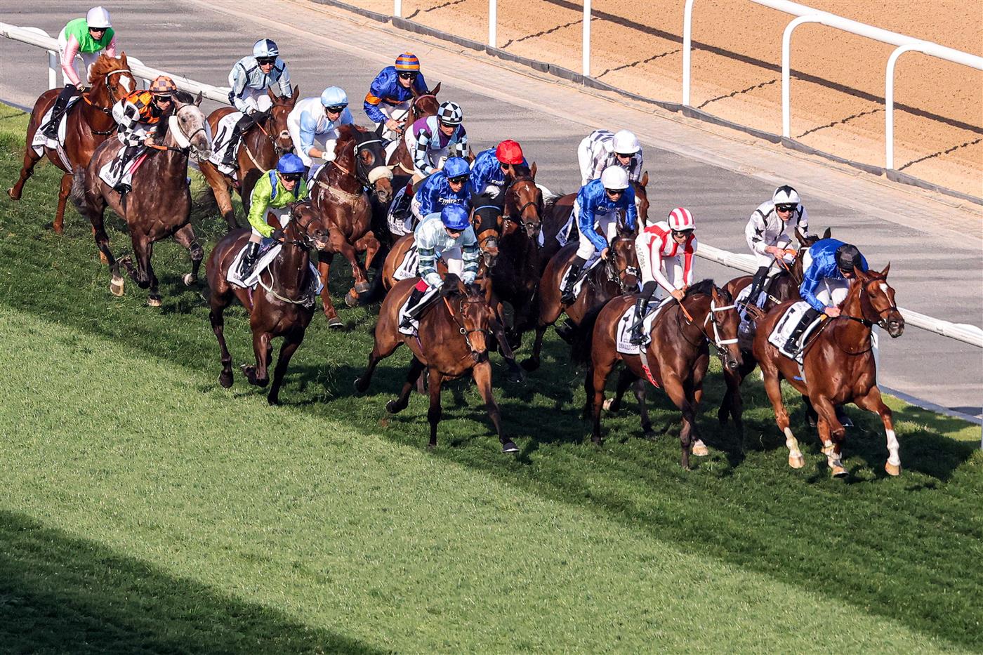 Jockeys compete in the Dubai Gold Cup race during the Dubai World Cup horse racing event at the Meydan racecourse in Dubai on March 25, 2023. (Photo by Karim SAHIB / AFP) / The erroneous mention[s] appearing in the metadata of this photo by Karim SAHIB has been modified in AFP systems in the following manner: [Jockeys compete] instead of [English jockey Ryan Moore, riding on the horse "Broome"]. Please immediately remove the erroneous mention[s] from all your online services and delete it (them) from your servers. If you have been authorized by AFP to distribute it (them) to third parties, please ensure that the same actions are carried out by them. Failure to promptly comply with these instructions will entail liability on your part for any continued or post notification usage. Therefore we thank you very much for all your attention and prompt action. We are sorry for the inconvenience this notification may cause and remain at your disposal for any further information you may require. (Photo by KARIM SAHIB/AFP via Getty Images)