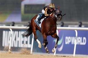DUBAI, UNITED ARAB EMIRATES - MARCH 25: Tyler Gaffalione riding Isolate wins the Godolphin Mile during the Dubai World Cup at Meydan Racecourse on March 25, 2023 in Dubai, United Arab Emirates. (Photo by Christopher Pike/Getty Images)