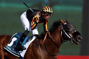 DUBAI, UNITED ARAB EMIRATES - MARCH 25: Tyler Gaffalione riding Isolate wins the Godolphin Mile during the Dubai World Cup at Meydan Racecourse on March 25, 2023 in Dubai, United Arab Emirates. (Photo by Christopher Pike/Getty Images)