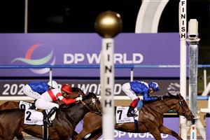 DUBAI, UNITED ARAB EMIRATES - MARCH 25: Lanfranco Dettori riding Lord North wins the Dubai Turf during the Dubai World Cup at Meydan Racecourse on March 25, 2023 in Dubai, United Arab Emirates. (Photo by Christopher Pike/Getty Images)