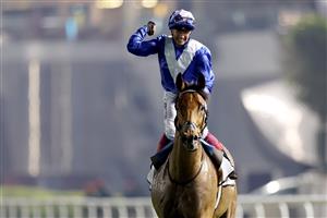 DUBAI, UNITED ARAB EMIRATES - MARCH 25: Lanfranco Dettori riding Lord North celebrates winning the Dubai Turf during the Dubai World Cup at Meydan Racecourse on March 25, 2023 in Dubai, United Arab Emirates. (Photo by Christopher Pike/Getty Images)