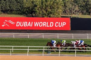 Jockeys compete in the Dubai Gold Cup race during the Dubai World Cup horse racing event at the Meydan racecourse in Dubai on March 25, 2023. (Photo by Karim SAHIB / AFP) / The erroneous mention[s] appearing in the metadata of this photo by Karim SAHIB has been modified in AFP systems in the following manner: [Jockeys compete] instead of [English jockey Ryan Moore, riding on the horse "Broome"]. Please immediately remove the erroneous mention[s] from all your online services and delete it (them) from your servers. If you have been authorized by AFP to distribute it (them) to third parties, please ensure that the same actions are carried out by them. Failure to promptly comply with these instructions will entail liability on your part for any continued or post notification usage. Therefore we thank you very much for all your attention and prompt action. We are sorry for the inconvenience this notification may cause and remain at your disposal for any further information you may require. (Photo by KARIM SAHIB/AFP via Getty Images)