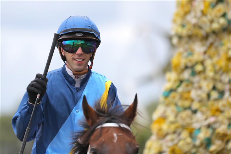 SYDNEY, AUSTRALIA - MARCH 25: Brenton Avdulla riding Roots wins Race 6 Canadian Club Emancipation during Sydney Racing at  Rosehill Gardens on March 25, 2023 in Sydney, Australia. (Photo by Jeremy Ng/Getty Images)