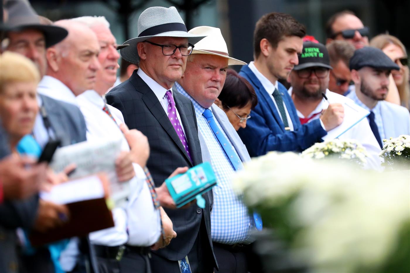 SYDNEY, AUSTRALIA - MARCH 25: Racegoers watch on in Race 1 Midway during Sydney Racing at Rosehill Gardens on March 25, 2023 in Sydney, Australia. (Photo by Jeremy Ng/Getty Images)