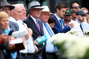 SYDNEY, AUSTRALIA - MARCH 25: Racegoers watch on in Race 1 Midway during Sydney Racing at Rosehill Gardens on March 25, 2023 in Sydney, Australia. (Photo by Jeremy Ng/Getty Images)