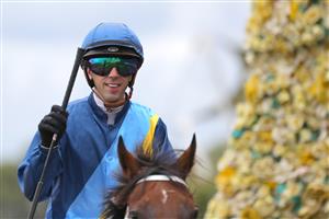 SYDNEY, AUSTRALIA - MARCH 25: Brenton Avdulla riding Roots wins Race 6 Canadian Club Emancipation during Sydney Racing at  Rosehill Gardens on March 25, 2023 in Sydney, Australia. (Photo by Jeremy Ng/Getty Images)