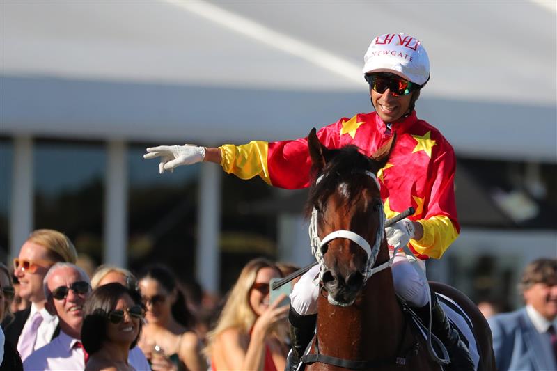 SYDNEY, AUSTRALIA - APRIL 15: Joao Moreira riding Militarize 
 wins Race 7 Moet & Chandon Champagne Stakes during "Schweppes All Aged Stakes Day" - Sydney Racing at Royal Randwick Racecourse on April 15, 2023 in Sydney, Australia. (Photo by Jeremy Ng/Getty Images)