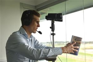 HAWKESBURY, AUSTRALIA - APRIL 22: Race caller Luke Marlow calls Race 3 Midway during Hawkesbury Cup Day Sydney Racing at Hawkesbury Racecourse on April 22, 2023 in Hawkesbury, Australia. (Photo by Jeremy Ng/Getty Images)