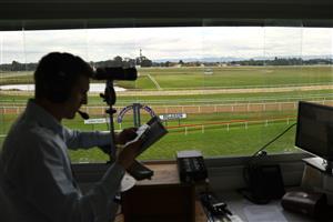 HAWKESBURY, AUSTRALIA - APRIL 22: Race caller Luke Marlow calls Race 3 Midway during Hawkesbury Cup Day Sydney Racing at Hawkesbury Racecourse on April 22, 2023 in Hawkesbury, Australia. (Photo by Jeremy Ng/Getty Images)