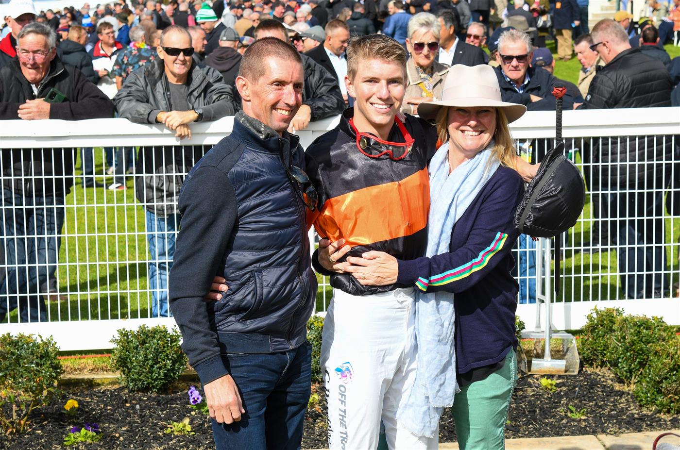 WARRNAMBOOL, AUSTRALIA - MAY 02: Campbell Rawiller poses with father Nash Rawiller and mother Sarah Rawiller after riding Teofilo Star to win in Race 2, the George Taylor Memorial Maiden Hurdle, during Brierly Steeplechase day at Warrnambool Racing Club on May 02, 2023 in Warrnambool, Australia. (Photo by Vince Caligiuri/Getty Images)