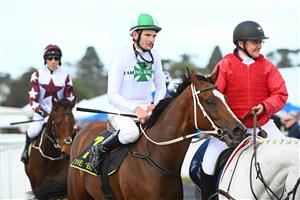 WARRNAMBOOL, AUSTRALIA - MAY 02:  Arron Lynch riding Pure Deal after winning Race 1, the Unboolievable Maiden Hurdle, during Brierly Steeplechase day at Warrnambool Racing Club on May 02, 2023 in Warrnambool, Australia. (Photo by Vince Caligiuri/Getty Images)
