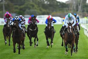 WARRNAMBOOL, AUSTRALIA - MAY 02:  Arron Lynch riding Pure Deal winning Race 1, the Unboolievable Maiden Hurdle, during Brierly Steeplechase day at Warrnambool Racing Club on May 02, 2023 in Warrnambool, Australia. (Photo by Vince Caligiuri/Getty Images)