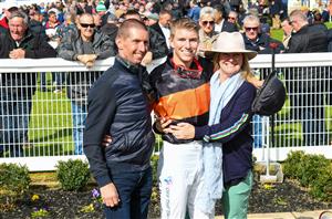 WARRNAMBOOL, AUSTRALIA - MAY 02: Campbell Rawiller poses with father Nash Rawiller and mother Sarah Rawiller after riding Teofilo Star to win in Race 2, the George Taylor Memorial Maiden Hurdle, during Brierly Steeplechase day at Warrnambool Racing Club on May 02, 2023 in Warrnambool, Australia. (Photo by Vince Caligiuri/Getty Images)