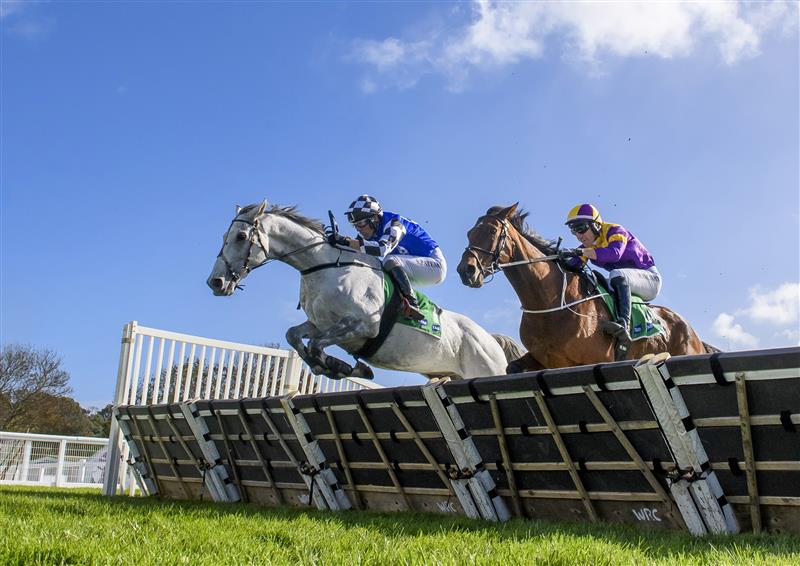 WARRNAMBOOL, AUSTRALIA - MAY 03: Steven Pateman riding Saunter Boy (L) jumps against William McCarthy riding Instigator before winning Race 6, the Sovereign Resort Galleywood Hurdle, during Galleywood Hurdle Day on May 03, 2023 in Warrnambool, Australia. (Photo by Vince Caligiuri/Getty Images)