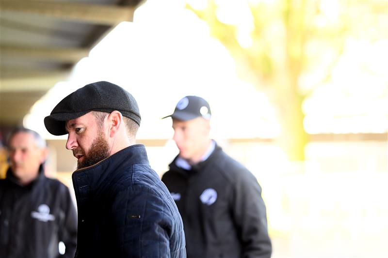 WARRNAMBOOL, AUSTRALIA - MAY 03: Trainer Ciaron Maher watches on in the stables during Galleywood Hurdle day at Warrnambool Racing Club on May 03, 2023 in Warrnambool, Australia. (Photo by Morgan Hancock/Getty Images)