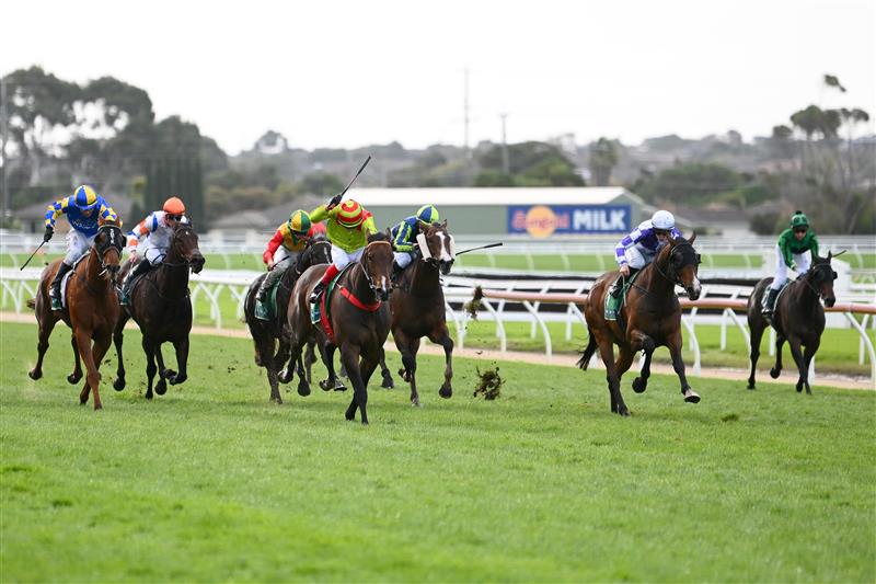 WARRNAMBOOL, AUSTRALIA - MAY 03: Dean Yendall rides Outlaws Revenge to victory in The Midfield Group Wangoom Handicap during Galleywood Hurdle day at Warrnambool Racing Club on May 03, 2023 in Warrnambool, Australia. (Photo by Morgan Hancock/Getty Images)