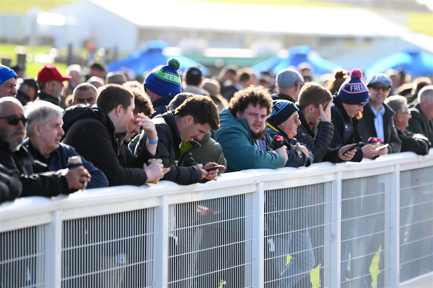 WARRNAMBOOL, AUSTRALIA - MAY 03: Crowds watch The Midfield Group Wangoom Handicap during Galleywood Hurdle day at Warrnambool Racing Club on May 03, 2023 in Warrnambool, Australia. (Photo by Morgan Hancock/Getty Images)
