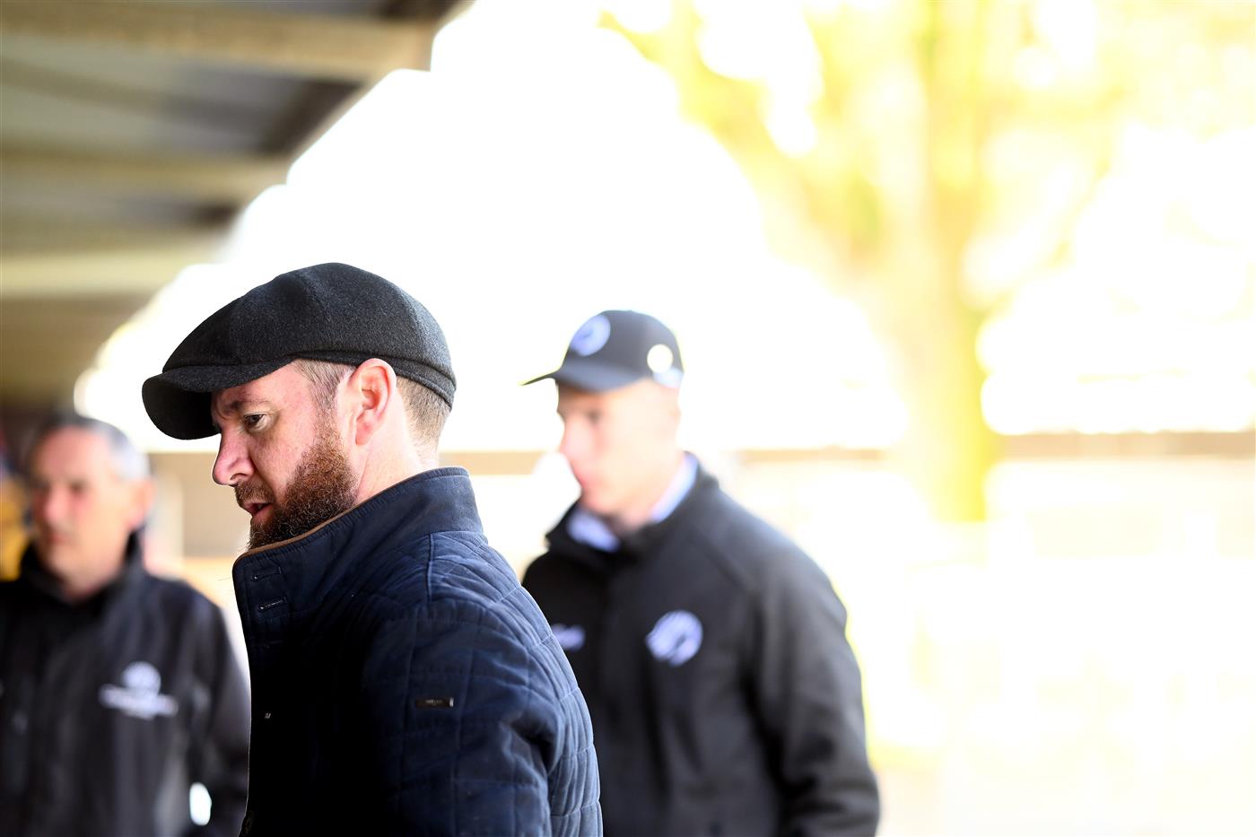 WARRNAMBOOL, AUSTRALIA - MAY 03: Trainer Ciaron Maher watches on in the stables during Galleywood Hurdle day at Warrnambool Racing Club on May 03, 2023 in Warrnambool, Australia. (Photo by Morgan Hancock/Getty Images)