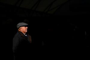 WARRNAMBOOL, AUSTRALIA - MAY 03: A spectator walks through the gates during Galleywood Hurdle day at Warrnambool Racing Club on May 03, 2023 in Warrnambool, Australia. (Photo by Morgan Hancock/Getty Images)