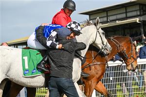 WARRNAMBOOL, AUSTRALIA - MAY 03: Steven Pateman riding Saunter Boy after winning Race 6, the Sovereign Resort Galleywood Hurdle, during Galleywood Hurdle Day on May 03, 2023 in Warrnambool, Australia. (Photo by Vince Caligiuri/Getty Images)
