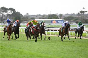 WARRNAMBOOL, AUSTRALIA - MAY 03: Dean Yendall rides Outlaws Revenge to victory in The Midfield Group Wangoom Handicap during Galleywood Hurdle day at Warrnambool Racing Club on May 03, 2023 in Warrnambool, Australia. (Photo by Morgan Hancock/Getty Images)