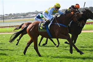 WARRNAMBOOL, AUSTRALIA - MAY 03: Kate Walters riding Delcoff winning Race 5, the Warrnambool Greyhound Cup Tonight Maiden, during Galleywood Hurdle Day on May 03, 2023 in Warrnambool, Australia. (Photo by Vince Caligiuri/Getty Images)