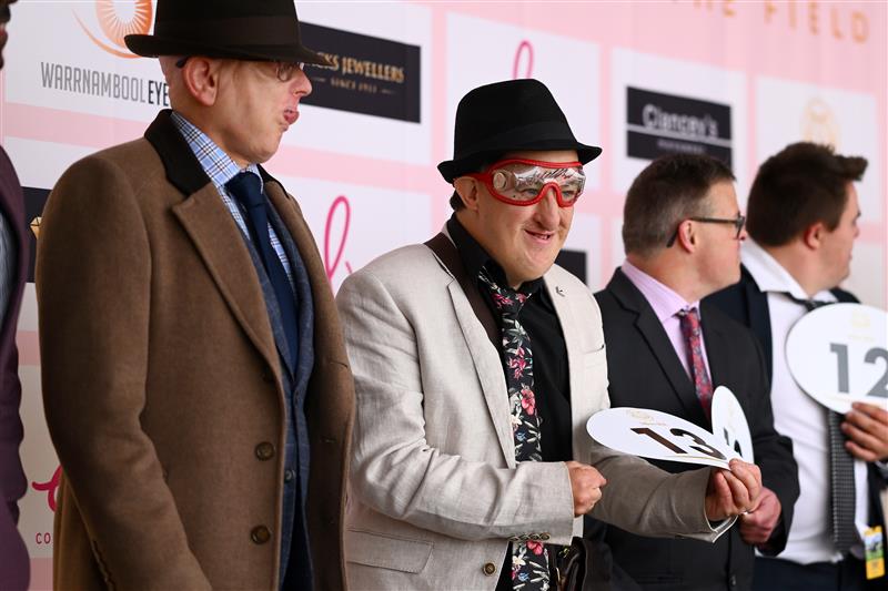 WARRNAMBOOL, AUSTRALIA - MAY 04: Fashions on the field entrants stand on stage during Grand Annual Day at Warrnambool Racing Club on May 04, 2023 in Warrnambool, Australia. (Photo by Morgan Hancock/Getty Images)