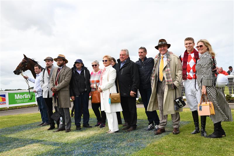 WARRNAMBOOL, AUSTRALIA - MAY 04: Campbell Rawiller poses with connections and parents Nash Rawiller and Sarah Rawiller after winning Race 1, the Hammonds Paints Champion Novice Hurdle, during Grand Annual Day at Warrnambool Racing Club on May 04, 2023 in Warrnambool, Australia. (Photo by Vince Caligiuri/Getty Images)