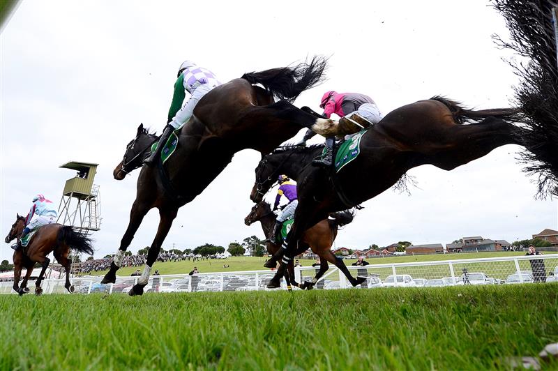 WARRNAMBOOL, AUSTRALIA - MAY 04: Chris McCarthy rides Rockstar Ronnie (left) to victory in the Brandt Grand Annual Steeplechase during Grand Annual Day at Warrnambool Racing Club on May 04, 2023 in Warrnambool, Australia. (Photo by Morgan Hancock/Getty Images)