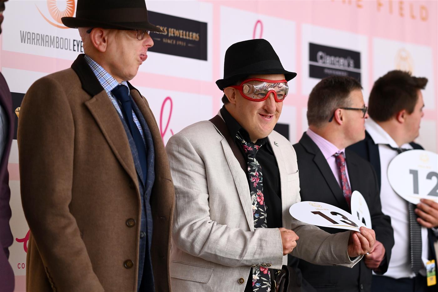 WARRNAMBOOL, AUSTRALIA - MAY 04: Fashions on the field entrants stand on stage during Grand Annual Day at Warrnambool Racing Club on May 04, 2023 in Warrnambool, Australia. (Photo by Morgan Hancock/Getty Images)