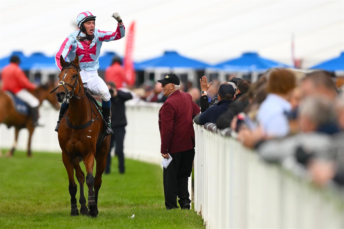 WARRNAMBOOL, AUSTRALIA - MAY 04: Chris McCarthy celebrates riding Rockstar Ronnie to victory in the Brandt Grand Annual Steeplechase during Grand Annual Day at Warrnambool Racing Club on May 04, 2023 in Warrnambool, Australia. (Photo by Morgan Hancock/Getty Images)