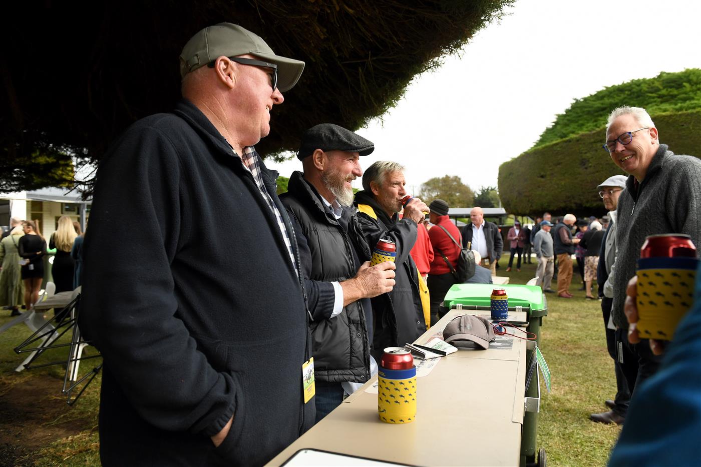 WARRNAMBOOL, AUSTRALIA - MAY 04: Punters drink from a makeshift bar during Grand Annual Day at Warrnambool Racing Club on May 04, 2023 in Warrnambool, Australia. (Photo by Morgan Hancock/Getty Images)