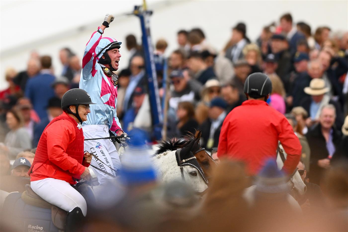 WARRNAMBOOL, AUSTRALIA - MAY 04: Chris McCarthy celebrates riding Rockstar Ronnie to victory in the Brandt Grand Annual Steeplechase during Grand Annual Day at Warrnambool Racing Club on May 04, 2023 in Warrnambool, Australia. (Photo by Morgan Hancock/Getty Images)